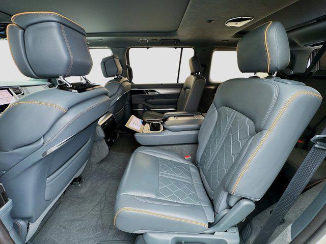 Photo of 2022 Luxury White Pearlcoat Jeep Grand Wagoneer
