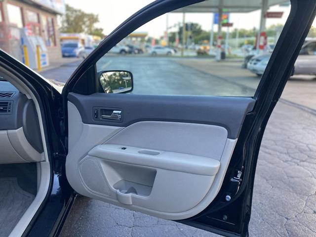 Photo of 2011 Tuxedo Black Metallic Ford Fusion