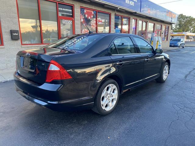Photo of 2011 Tuxedo Black Metallic Ford Fusion