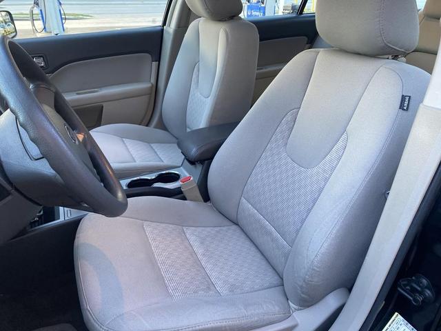 Photo of 2011 Tuxedo Black Metallic Ford Fusion