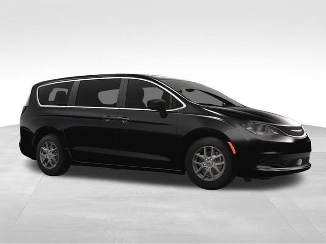 Photo of 2025 Diamond Black Chrysler Voyager