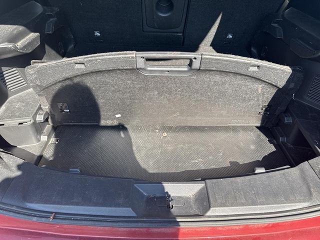 Photo of 2015 Cayenne Red Pearl Nissan Rogue