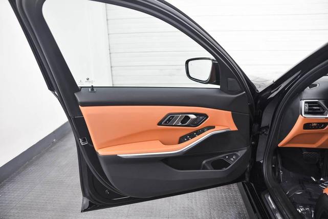 Photo of 2023 Jet Black BMW 330e