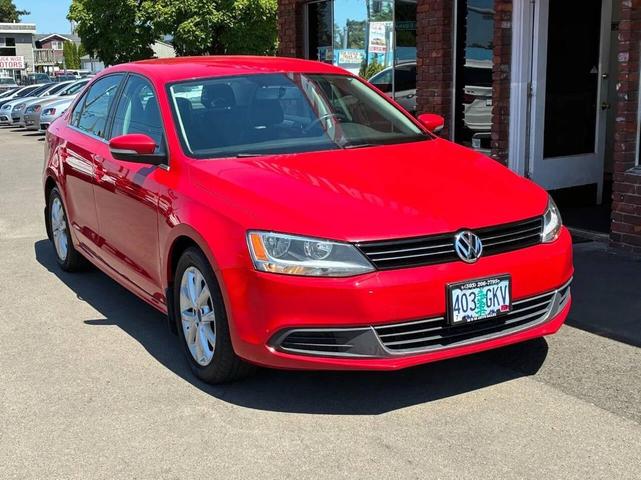 Photo of 2013 Tornado Red Volkswagen Jetta