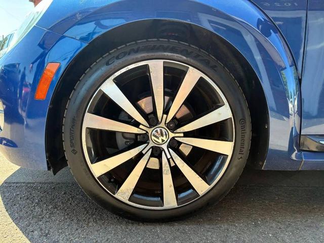 Photo of 2012 Reef Blue Metallic Volkswagen Beetle