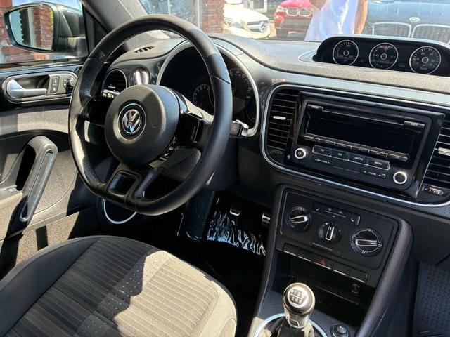Photo of 2012 Reef Blue Metallic Volkswagen Beetle