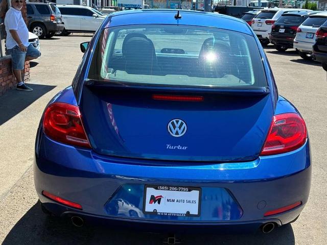 Photo of 2012 Reef Blue Metallic Volkswagen Beetle
