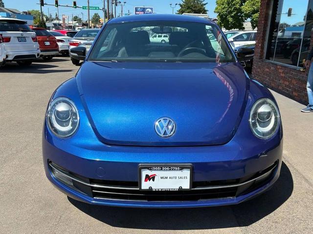 Photo of 2012 Reef Blue Metallic Volkswagen Beetle