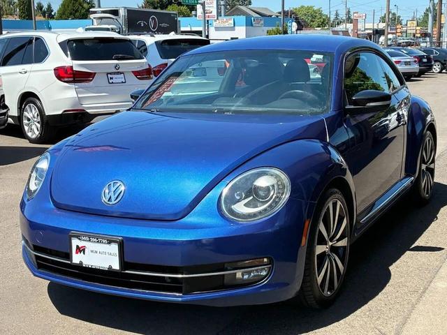 Photo of 2012 Reef Blue Metallic Volkswagen Beetle