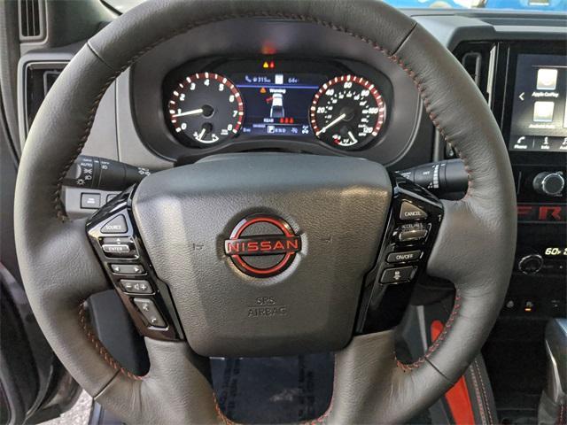 Photo of 2026 Gun Metallic Nissan Frontier