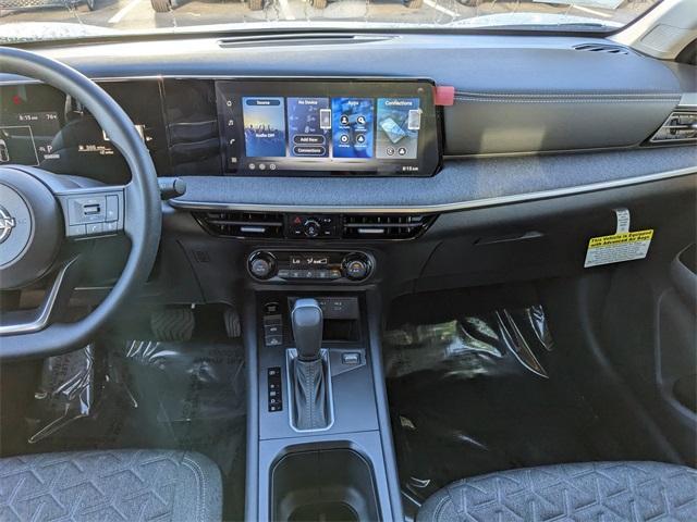 Photo of 2026 Aspen White Tri Nissan Kicks