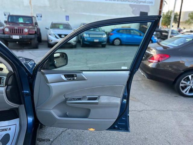 Photo of 2009 Newport Blue Pearl Subaru Forester