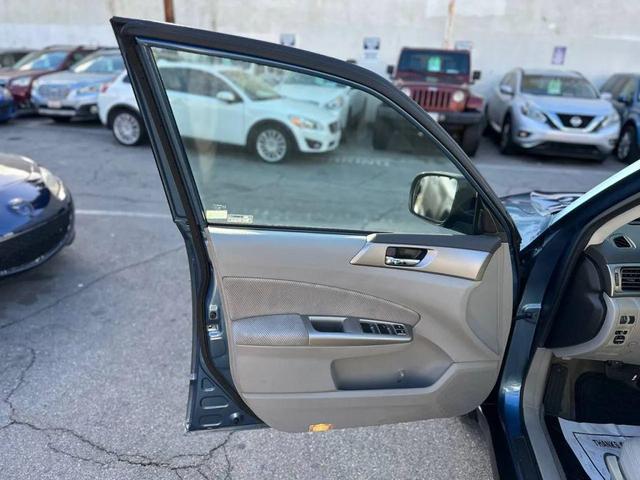 Photo of 2009 Newport Blue Pearl Subaru Forester