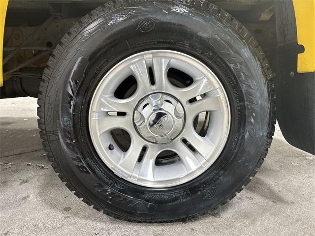 Photo of 2002 Yellow Ford Ranger