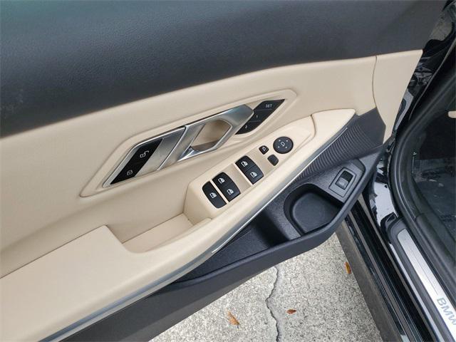 Photo of 2022 Jet Black BMW 330