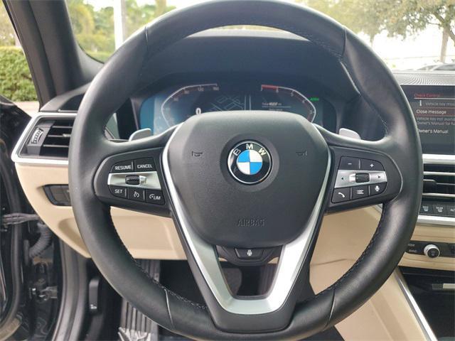 Photo of 2022 Jet Black BMW 330