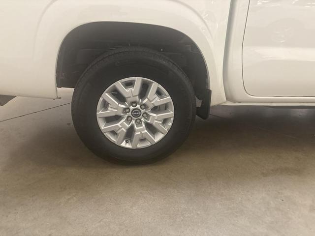 Photo of 2024 Glacier White Nissan Frontier