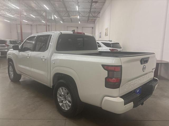 Photo of 2024 Glacier White Nissan Frontier