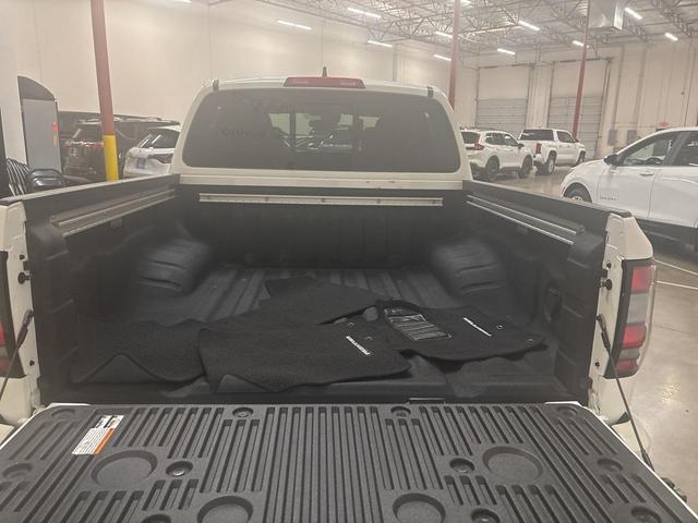Photo of 2024 Glacier White Nissan Frontier