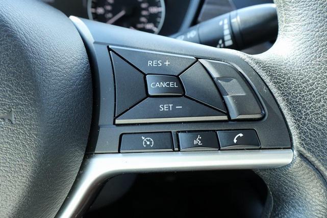 Photo of 2024 Super Black Clearcoat Nissan Altima