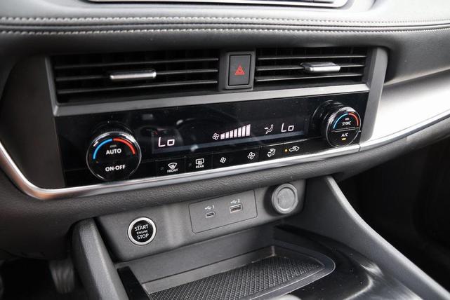 Photo of 2023 Pearl White Tricoat Nissan Rogue