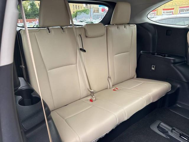 Photo of 2023 Midnight Black Metallic Toyota Highlander