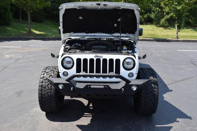 Photo of 2018 Bright White Clearcoat Jeep Wrangler JK Unlimited