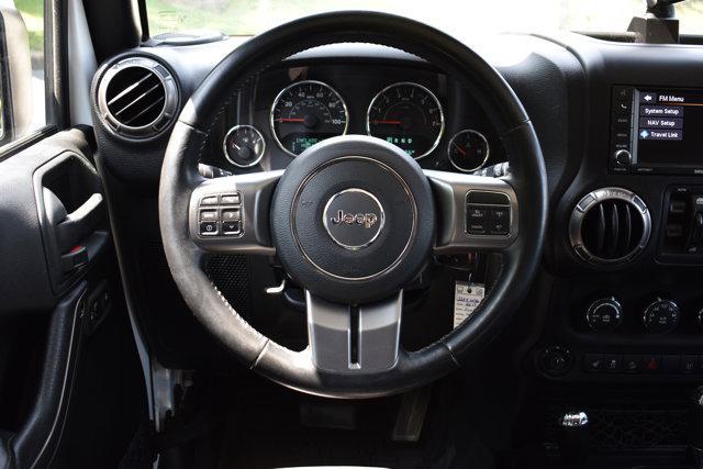 Photo of 2018 Bright White Clearcoat Jeep Wrangler JK Unlimited