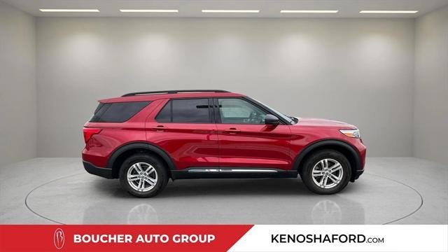 Photo of 2022 Rapid Red Metallic Tinted Clearcoat Ford Explorer