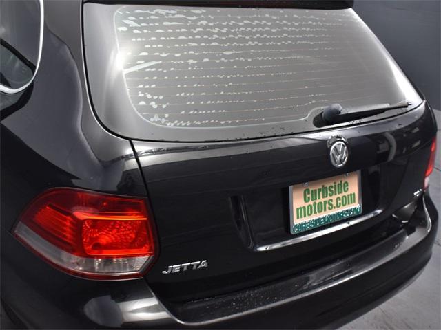 Photo of 2013 Black Uni Volkswagen Jetta SportWagen