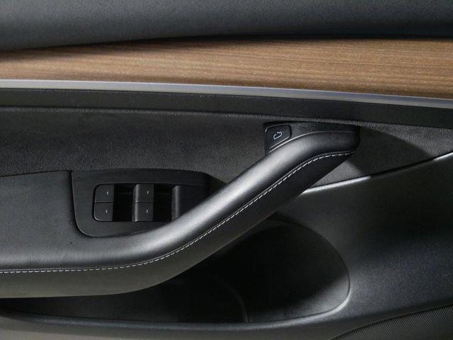 Photo of 2022 Deep Blue Metallic Tesla Model 3
