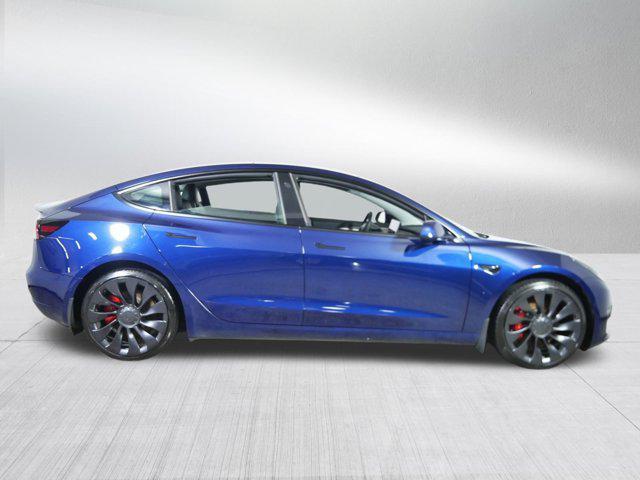 Photo of 2022 Deep Blue Metallic Tesla Model 3