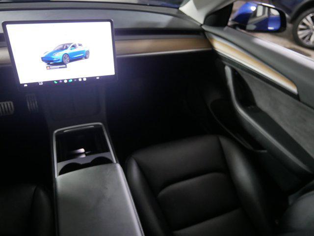 Photo of 2022 Deep Blue Metallic Tesla Model 3