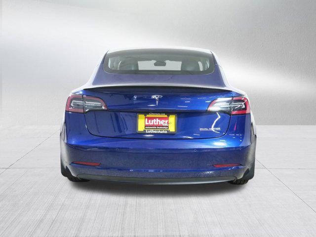 Photo of 2022 Deep Blue Metallic Tesla Model 3