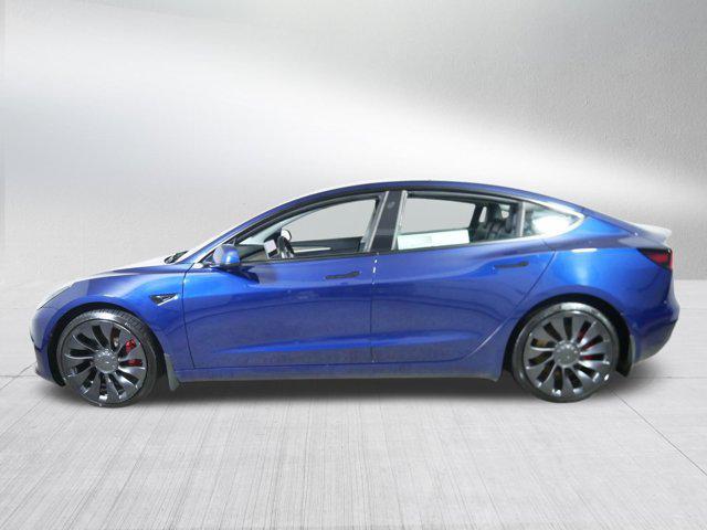 Photo of 2022 Deep Blue Metallic Tesla Model 3