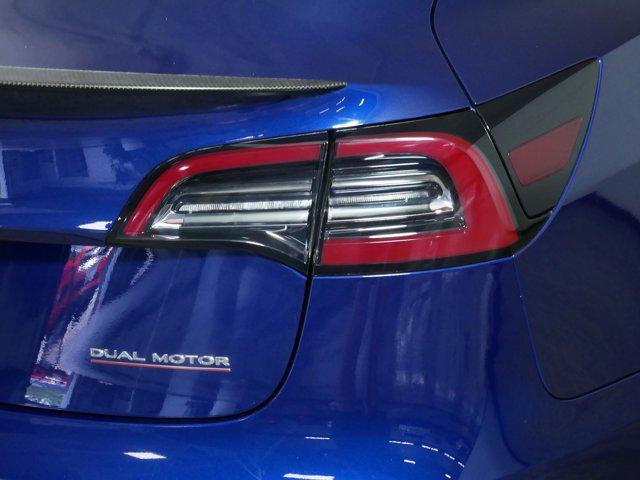 Photo of 2022 Deep Blue Metallic Tesla Model 3