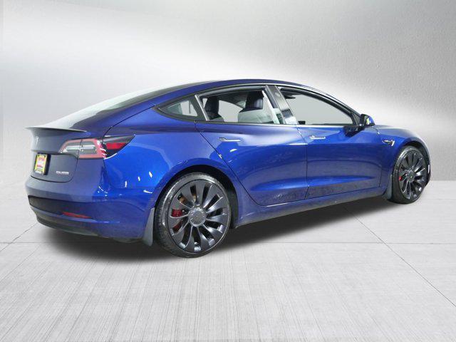 Photo of 2022 Deep Blue Metallic Tesla Model 3