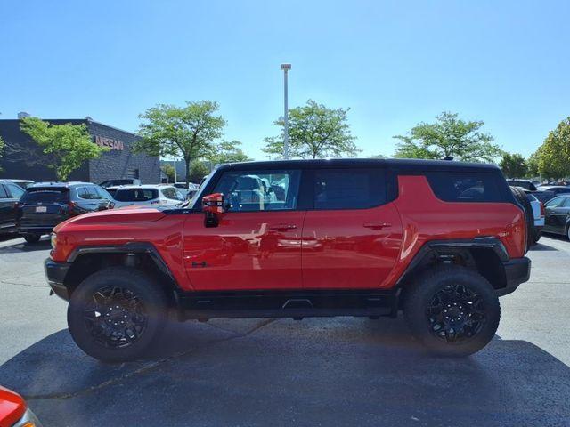 Photo of 2025 Solar Orange GMC HUMMER EV SUV