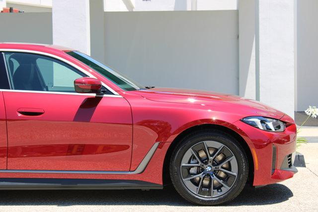 Photo of 2025 Red Metallic BMW i4 Gran Coupe