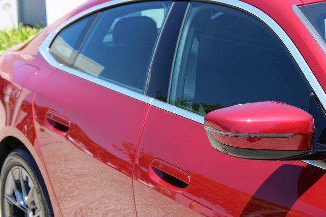 Photo of 2025 Red Metallic BMW i4 Gran Coupe