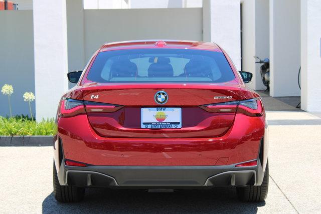 Photo of 2025 Red Metallic BMW i4 Gran Coupe