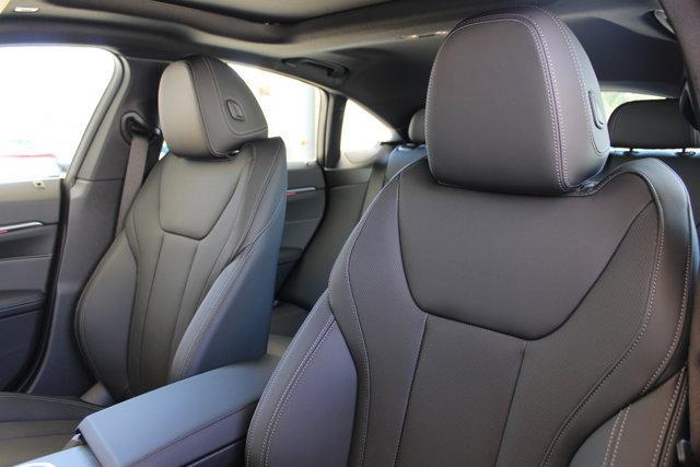 Photo of 2025 Red Metallic BMW i4 Gran Coupe