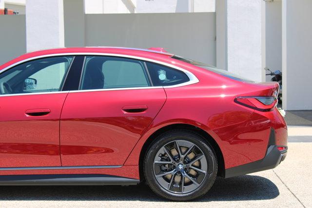 Photo of 2025 Red Metallic BMW i4 Gran Coupe