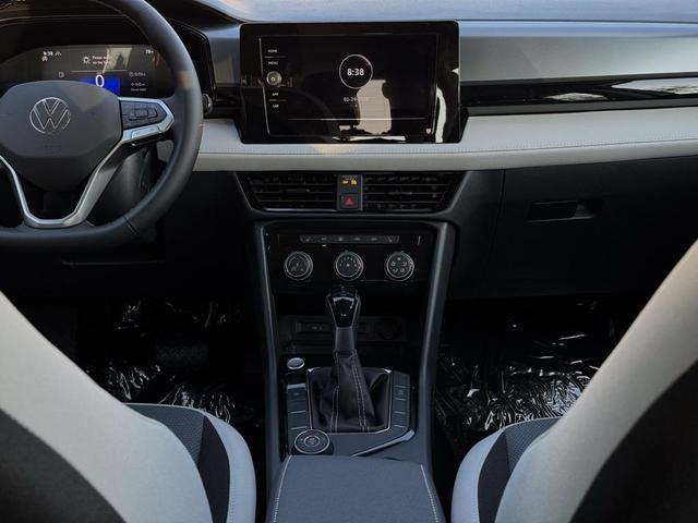 Photo of 2025 Pure White Volkswagen Taos