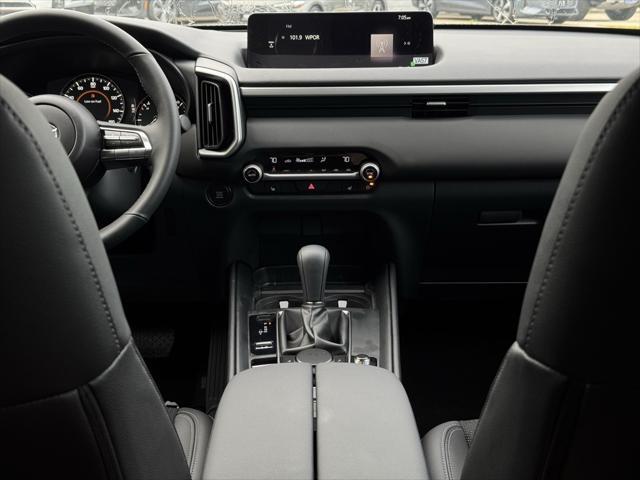 Photo of 2025 Ingot Blue Metallic Mazda CX-50