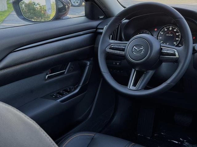 Photo of 2025 Soul Red Crystal Metallic Mazda CX-50 Hybrid