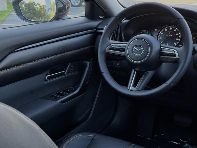 Photo of 2025 Soul Red Crystal Metallic Mazda CX-50 Hybrid