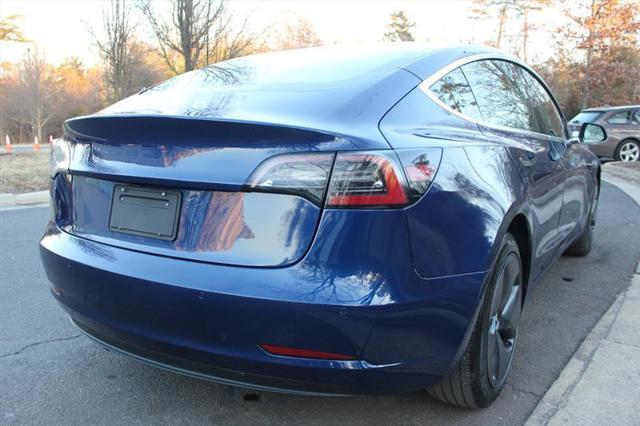 Photo of 2018 Deep Blue Metallic Tesla Model 3
