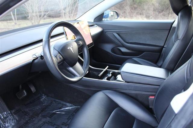 Photo of 2018 Deep Blue Metallic Tesla Model 3