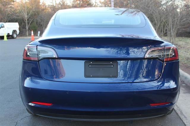 Photo of 2018 Deep Blue Metallic Tesla Model 3
